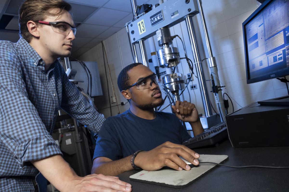 two students at a screen